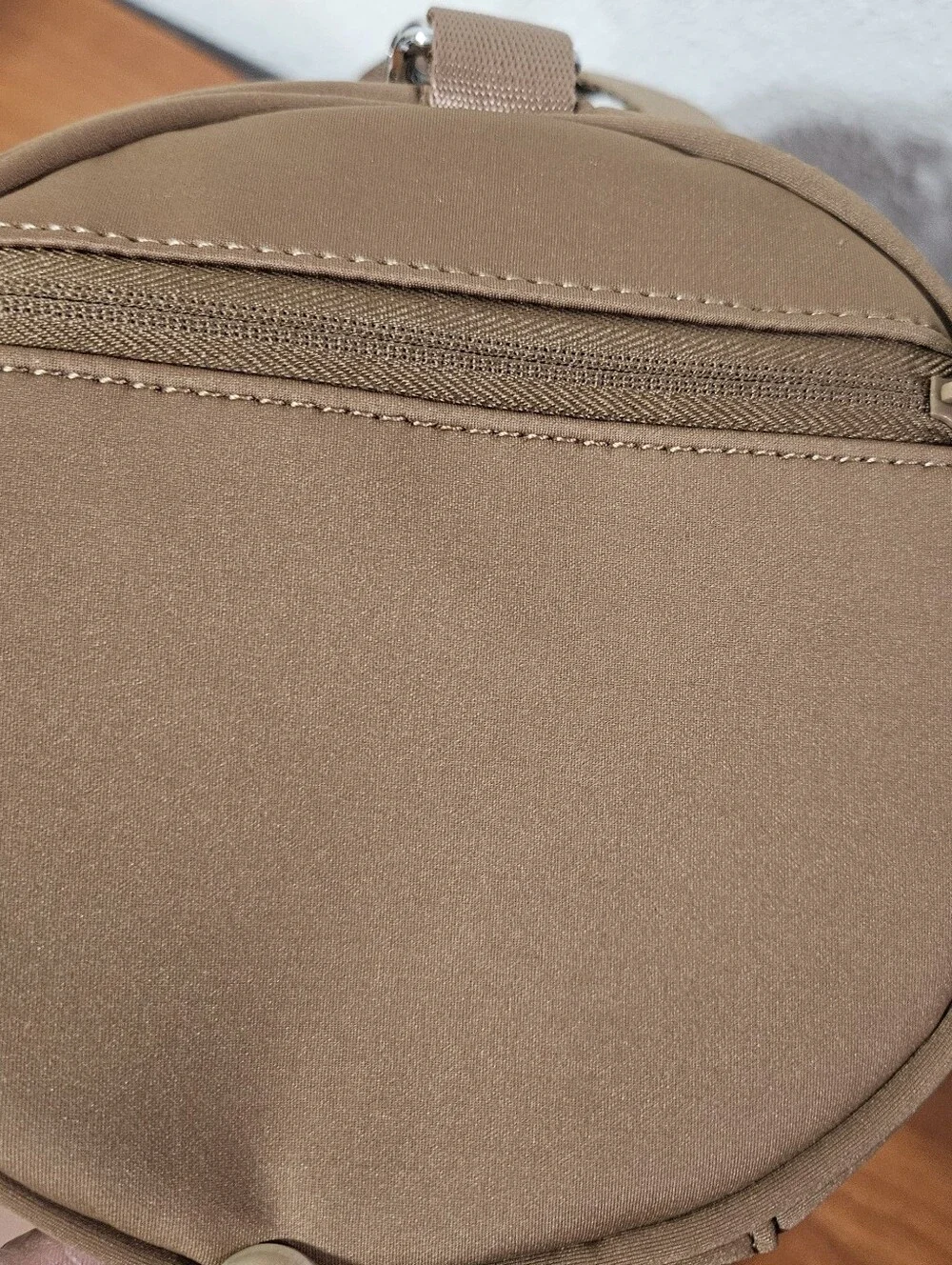 Tan Tiny Iris Duffle Bag with Adjustable crossbody Strap